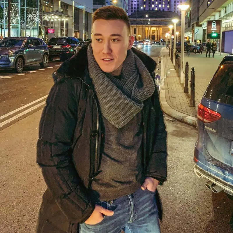 Arthur on a city street at night